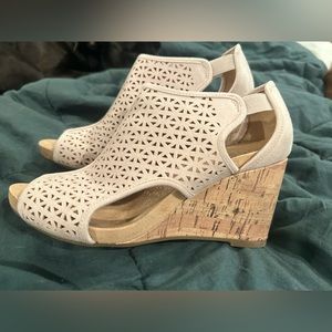 Comfortable wedges. Worn a couple times, but very very comfy.